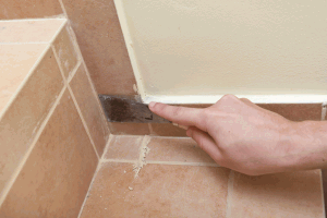 Removing hardened grout from tiles