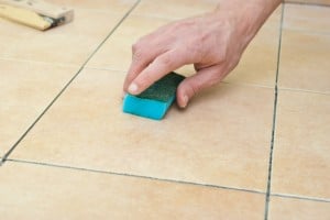 Spraying water on floor tiles