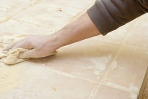 Cleaning grout of floor tiles