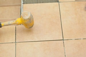 Setting tile into place