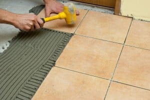 Laying tile on tile adhesive Laying tile on tile adhesive